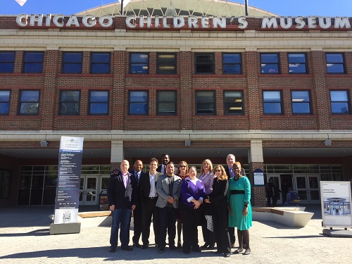 State legislators in front of the Chicago Children's Museum at Navy Pier.